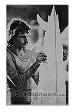 Michael Peterson Inspects one of his designs