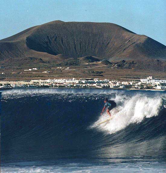 Around 1990 I was lucky enough to live in the Canary Islands for a while this is a photo of me surfing a place called Lobos