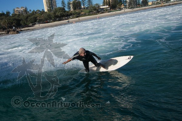 Rabbit bartholemew bottom turns at Snapper Rocks